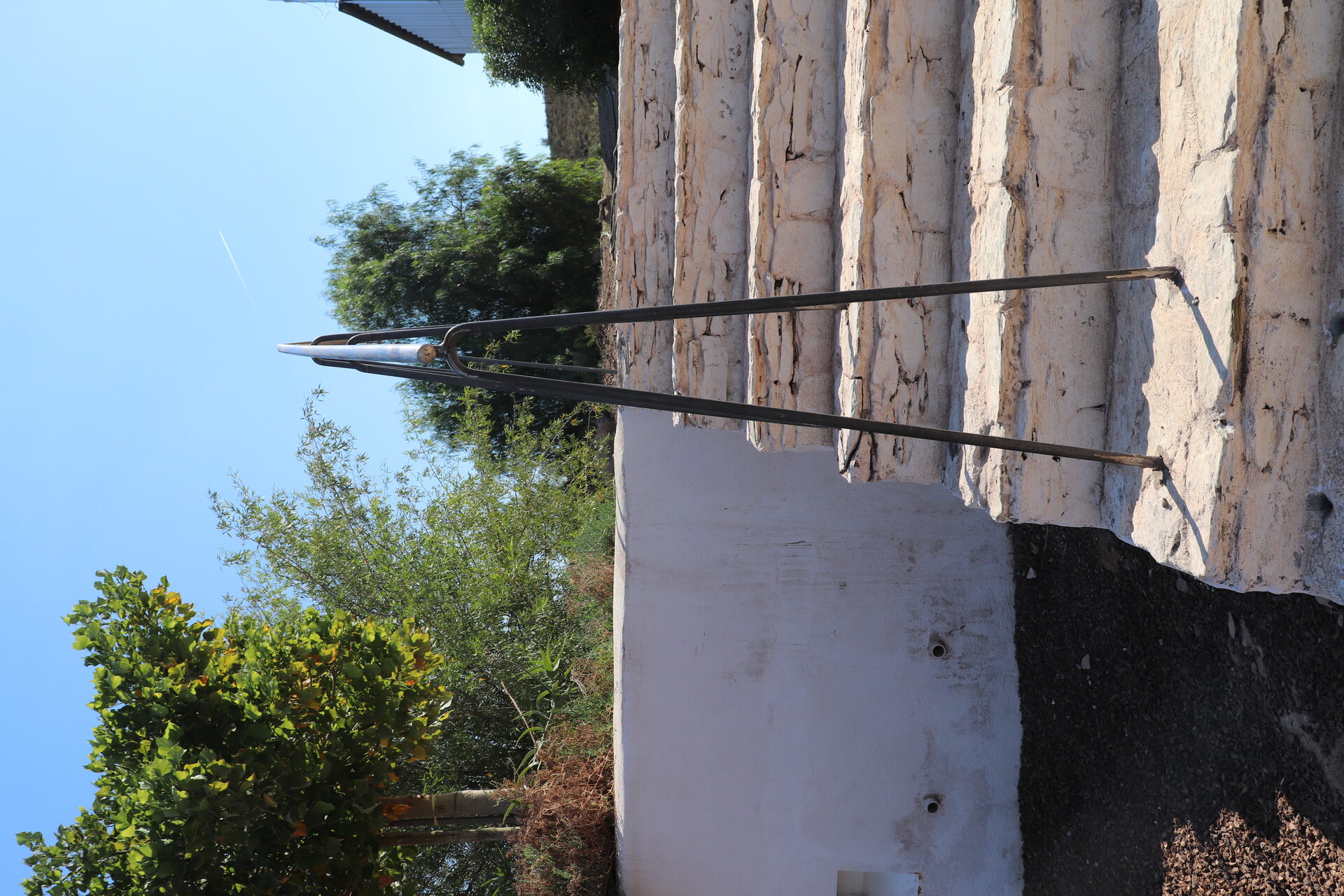 Buffelsdrift staircase — hand-forged steel hairpin stringers