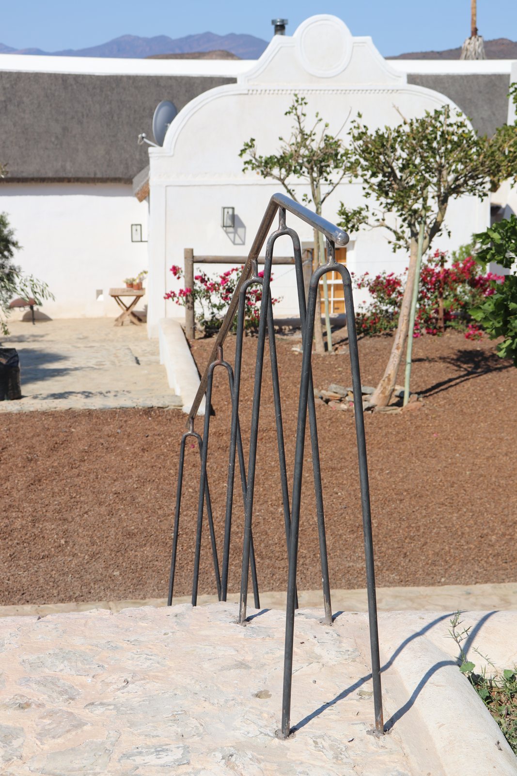 16mm roundbar balustrade — fanned hairpin uprights at the Buffelsdrift entrance steps