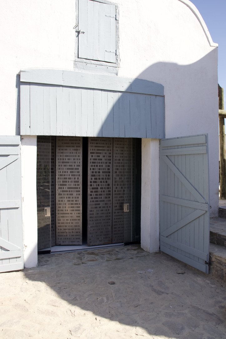 Sliding screens behind the timber shed doors, Buffelsdrift