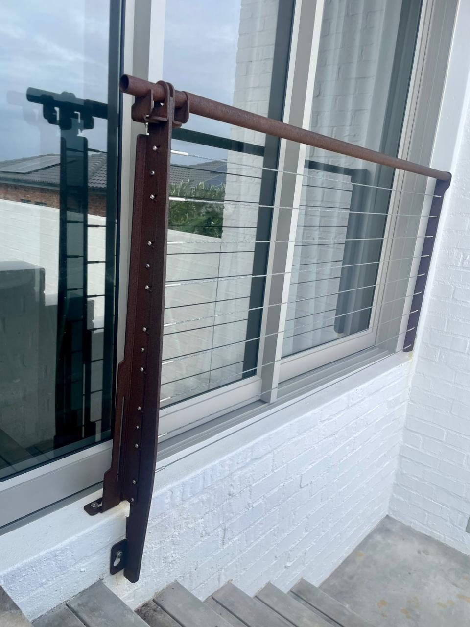 Folded plate balustrade — upright at stair