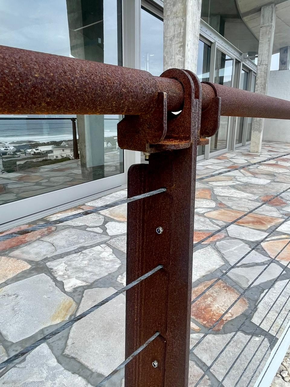 Folded plate balustrade — plate and handrail detail