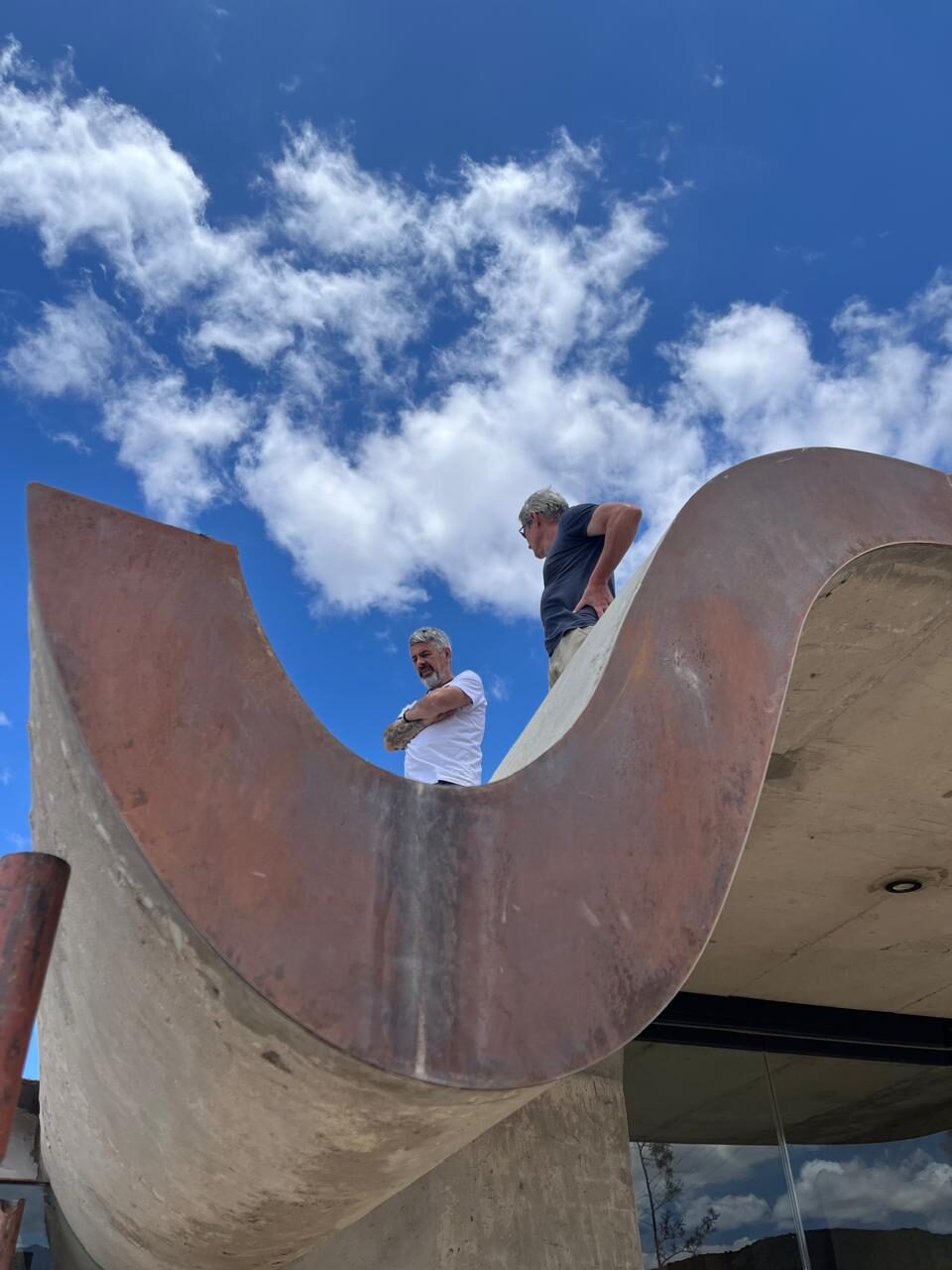Exterior — curved concrete roof edge