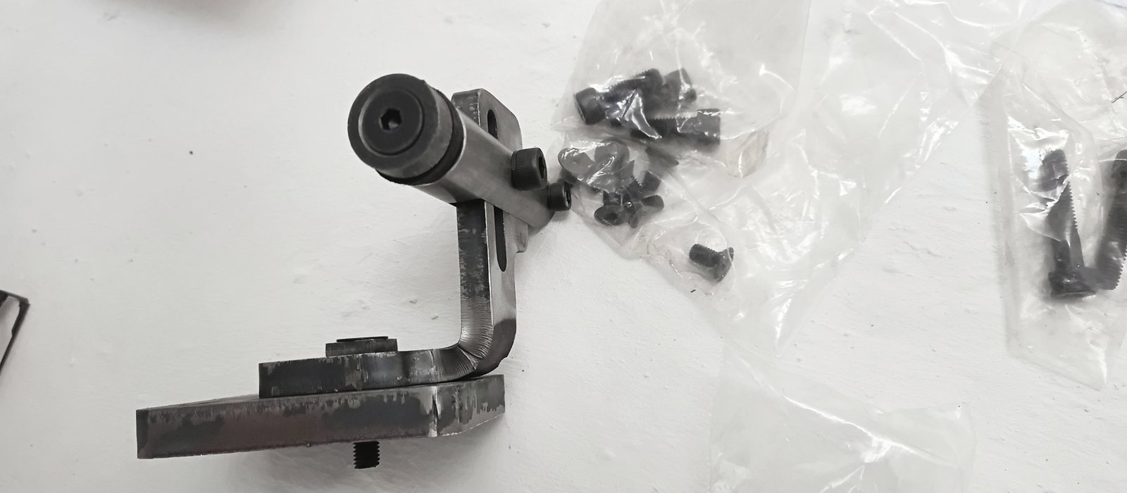 Glass hanger — machined top-hanger mechanism and fixings